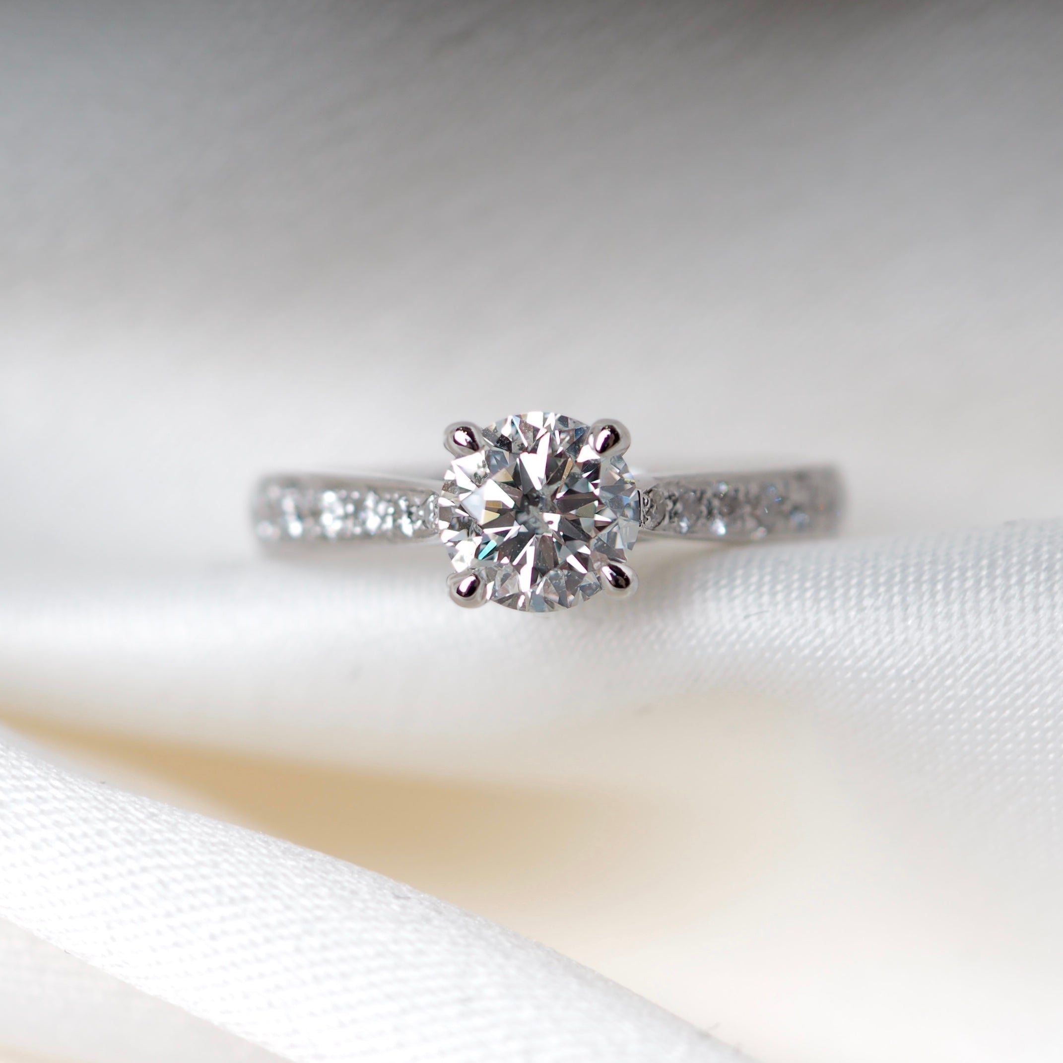 ROUND BRILLIANT DIAMOND SOLITAIRE PAVE BAND ENGAGEMENT RING - Fogal & Barnes