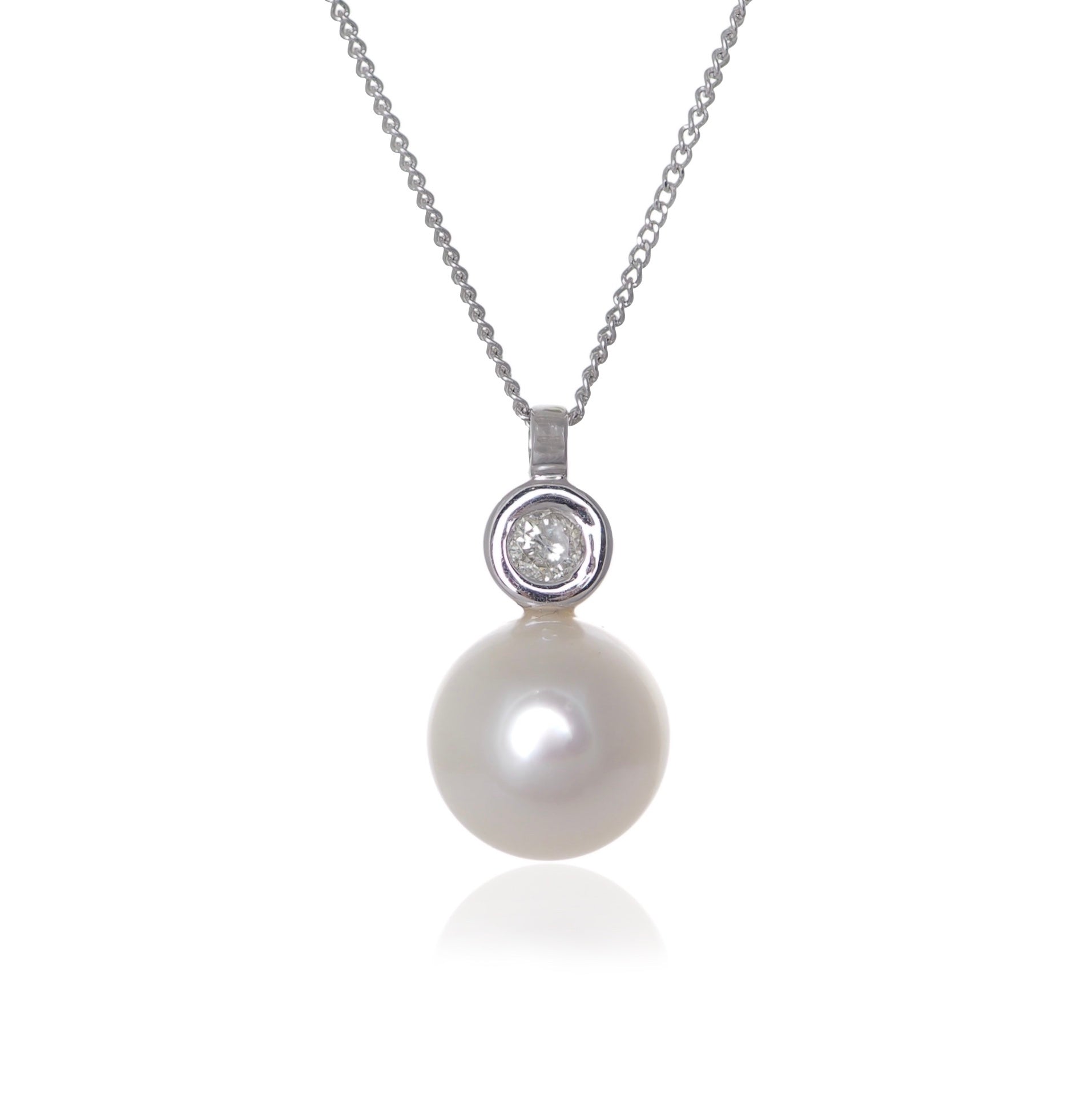 PEARL AND DIAMOND PENDANT - Fogal & Barnes