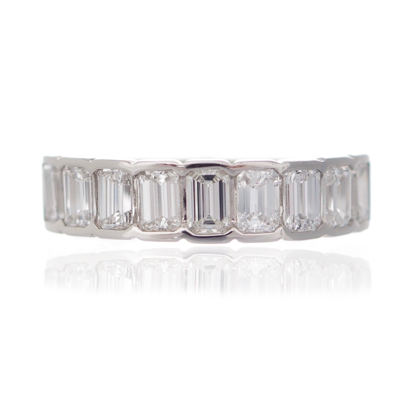 Emerald cut diamond half eternity ring platinum half eternity Harrogate jewellers Fogal and barnes