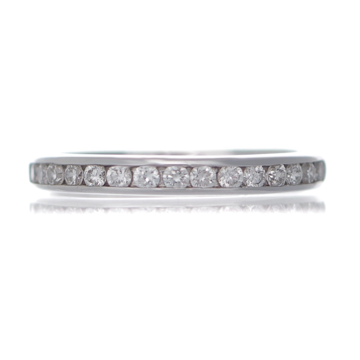 Round brilliant cut diamonds channel set white gold wedding eternity band
