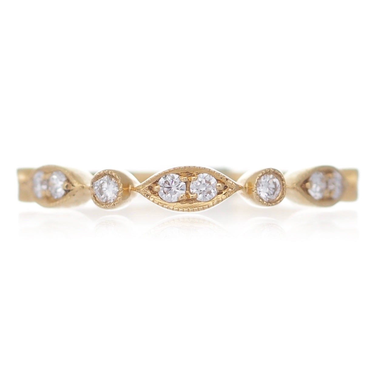 Delicate diamond set wedding eternity ring millegraine setting yellow gold Harrogate jewellers Fogal and barnes