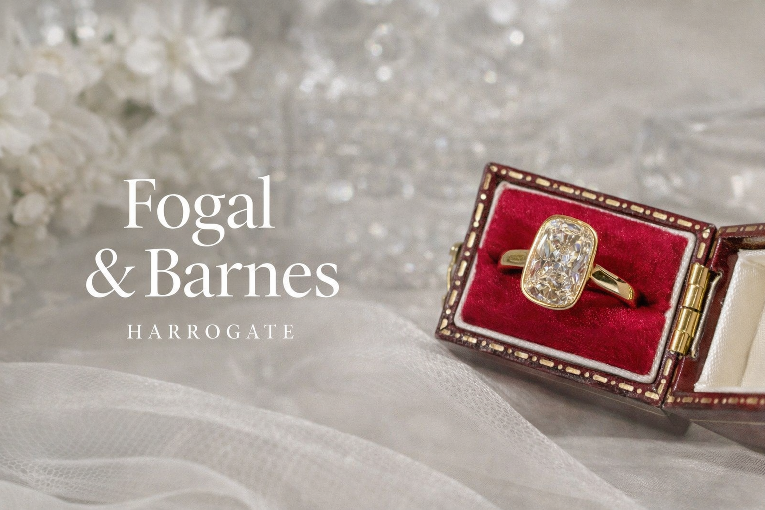 Cushion-cut diamond bezel set engagement ring in gold, presented in a vintage red velvet box with soft tulle, by Fogal & Barnes Fine Jewellers of Harrogate.