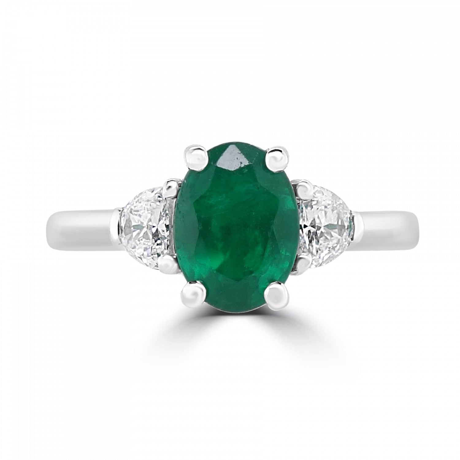 OVAL EMERALD AND DIAMOND TRILOGY ENGAGEMENT RING