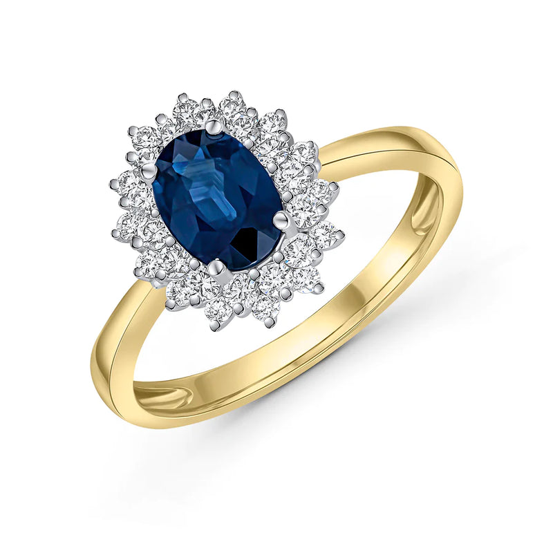 OVAL SAPPHIRE & ROUND DIAMOND CLUSTER RING