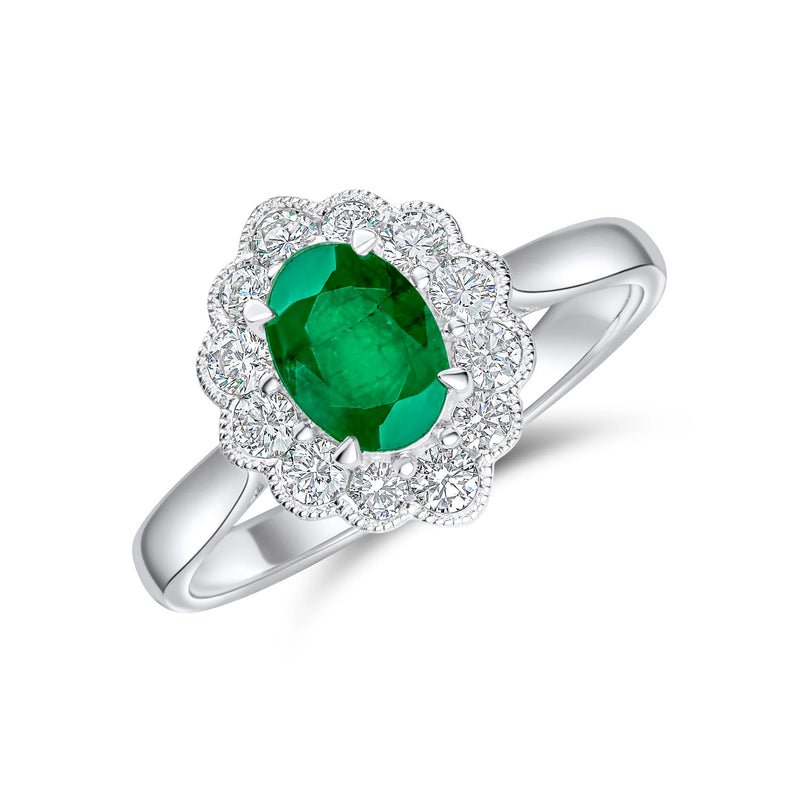OVAL EMERALD & CLUSTER DIAMOND ENGAGMENT RING