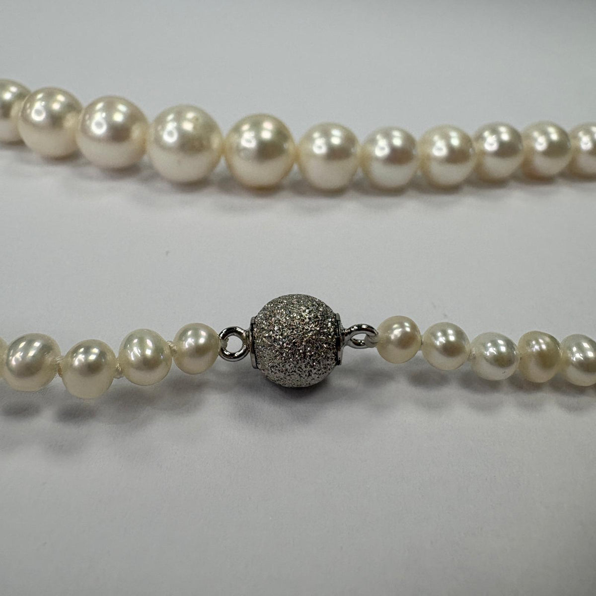 graduated pearl necklace, white freshwater pearl necklace, bridal pearl necklace UK, princess length pearl necklace, 18 inch pearl necklace, pearl necklace magnetic clasp, pre-loved pearl necklace, classic pearl necklace