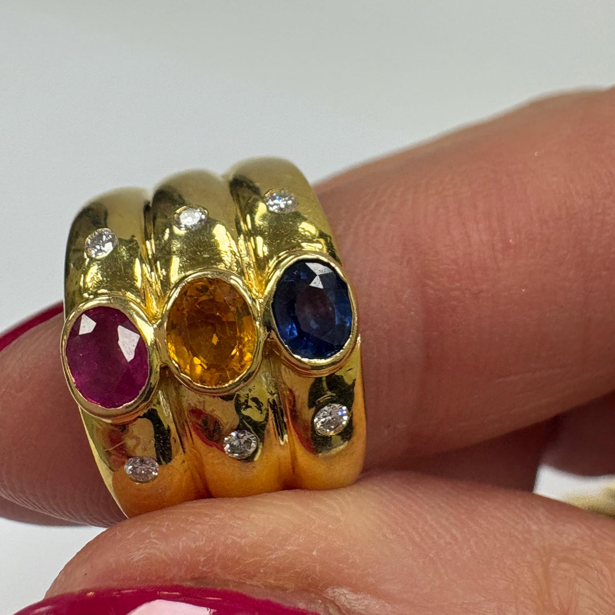 multi gem ring, ruby sapphire citrine ring, 18ct gold statement ring, triple band ring UK, wide gold gemstone ring, cocktail ring gold, pre-loved gemstone ring, birthstone family ring