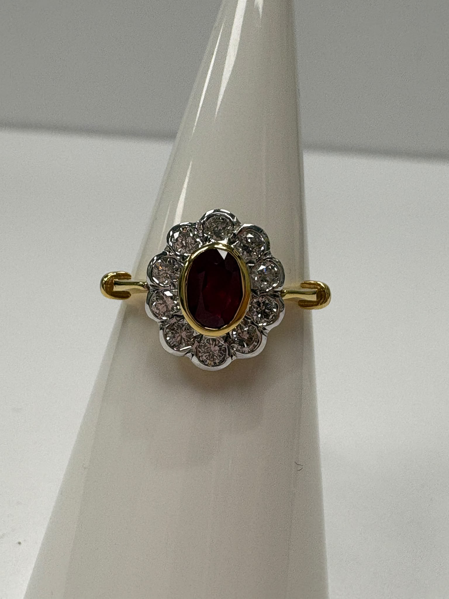 vintage ruby diamond ring, 18ct gold ruby cluster ring, oval ruby ring, ruby engagement ring alternative, pre-loved ruby ring UK, vintage cluster ring Harrogate, diamond halo ruby ring, second hand ruby ring size N