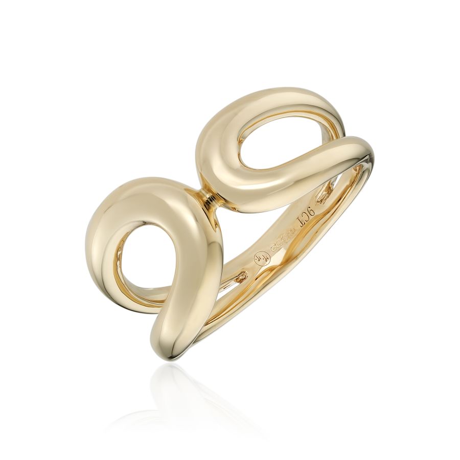 Gold ring with a unique design on a white background