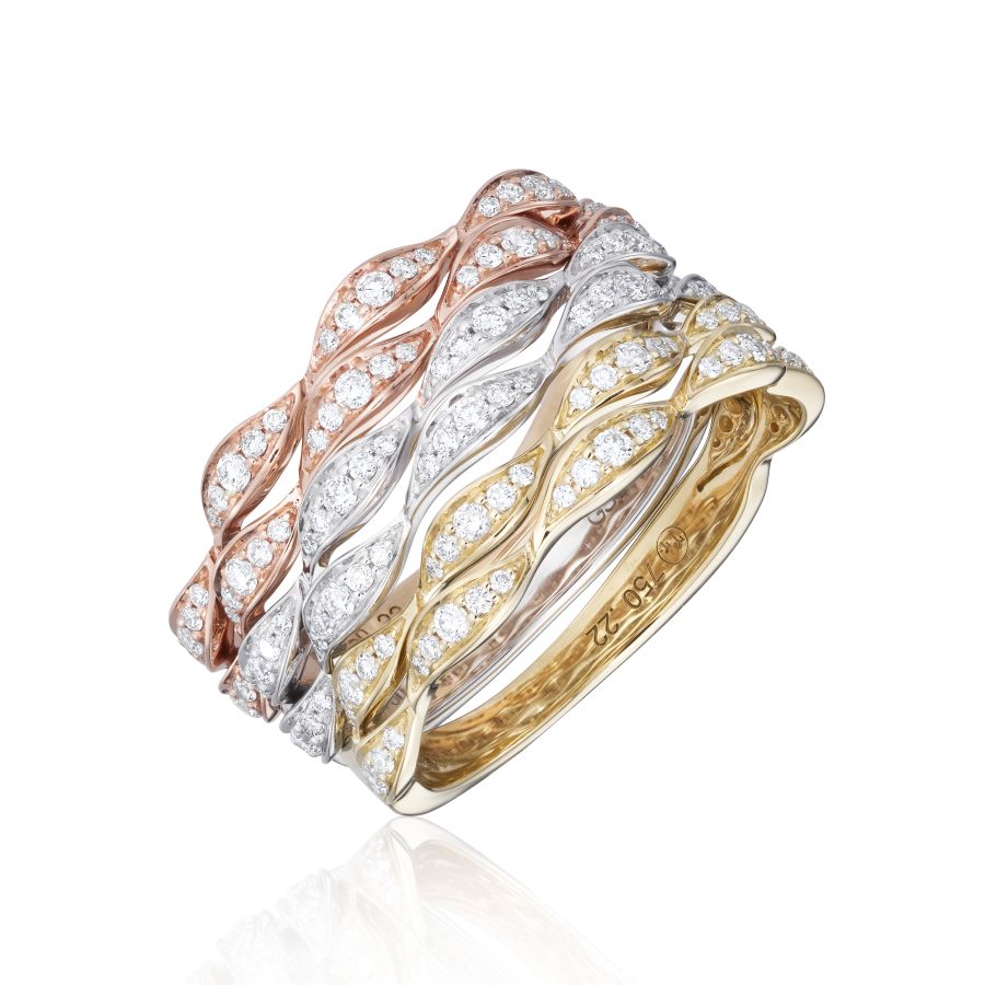 Diamond ripple stack rings stacked in 18ct yellow gold, white gold and rose gold showing all three metal options together