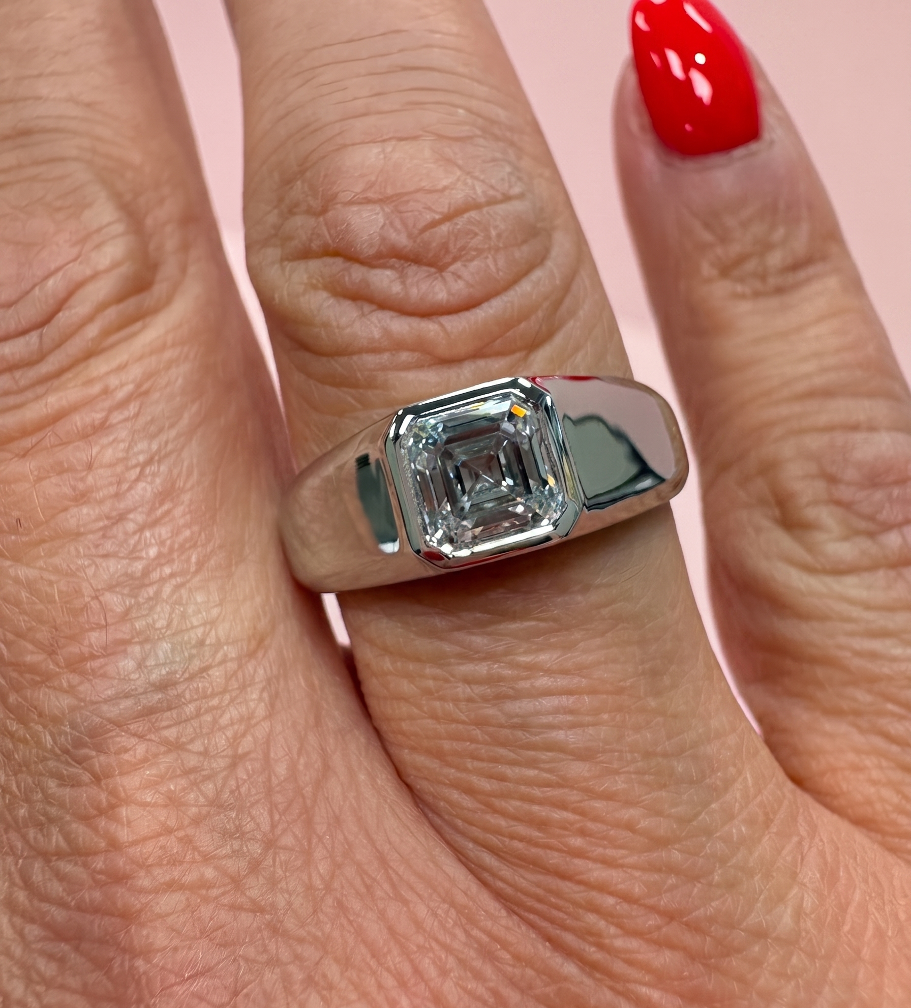 Asscher cut engagement ring, Asscher cut diamond ring, bezel set diamond ring, art deco style engagement ring, chunky Asscher ring, lab grown diamond engagement ring UK, bespoke diamond ring Harrogate, platinum Asscher ring, 18ct gold Asscher ring, certified lab grown diamond, 1.50ct diamond ring, custom engagement ring Yorkshire, statement solitaire ring, geometric diamond ring, lab grown diamond ring near me, DVS1 Asscher diamond