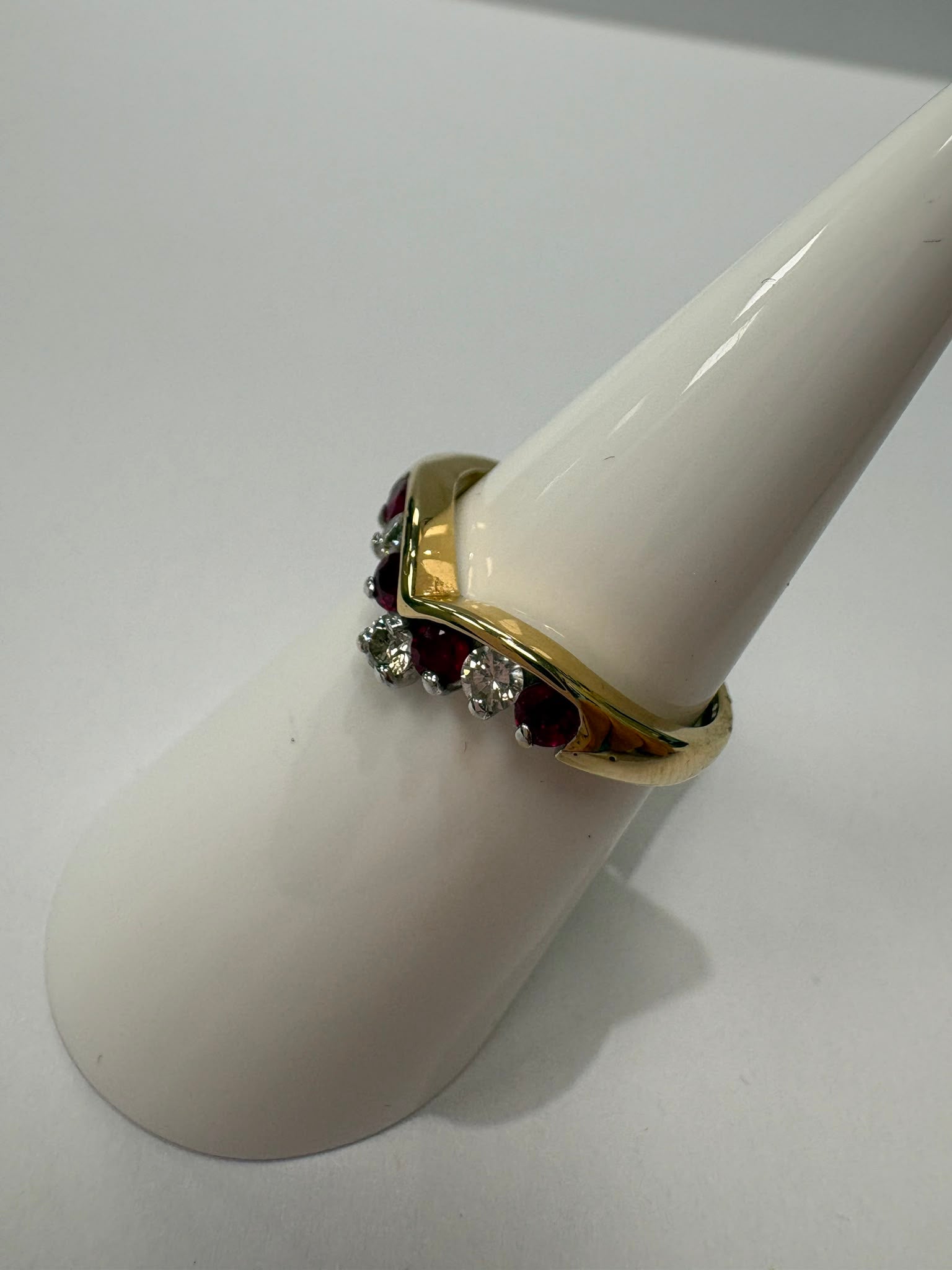 ruby and diamond wishbone ring, chevron ring ruby diamond, natural ruby ring UK, second hand wishbone ring, pre-loved ruby ring, vintage wishbone ring, 9ct gold ruby diamond ring, ruby diamond stacking ring, wishbone wedding ring, second hand jewellery Harrogate, second hand jewellery Leeds, second hand jewellery York, second hand jewellery Yorkshire, pre-owned natural ruby ring UK, natural diamond wishbone ring, unique ruby ring, buy second hand wishbone ring, wishbone ring size N, ruby ring near me, fine 