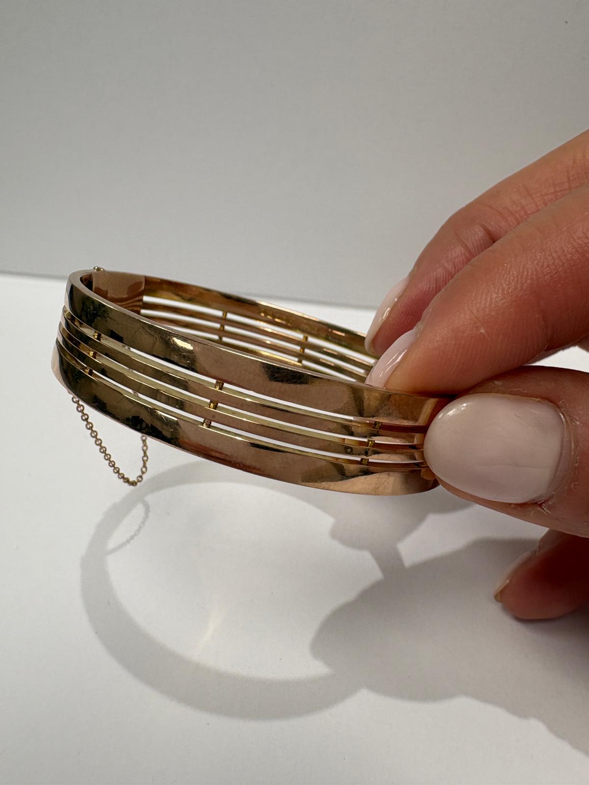 Vintage 9ct gold gate bangle with safety chain, Fogal & Barnes Harrogate