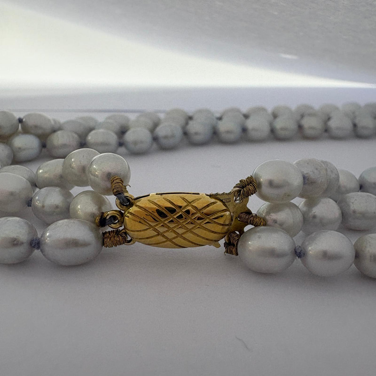 grey pearl necklace, triple strand pearl necklace, freshwater pearl necklace UK, multi strand pearl necklace, silver grey pearls, pearl necklace gold clasp, pre-loved pearl necklace, statement pearl necklace