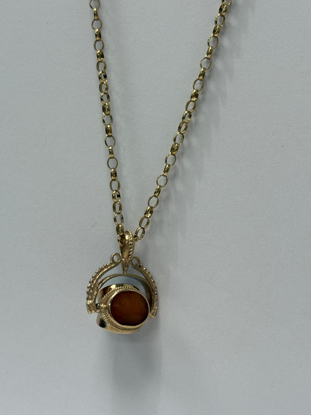 9ct gold spinner pendant, vintage fob necklace, multi stone gold pendant, tiger's eye onyx turquoise necklace, gold belcher chain necklace, pre-loved fob pendant UK, spinning gemstone pendant, second hand gold necklace Harrogate
