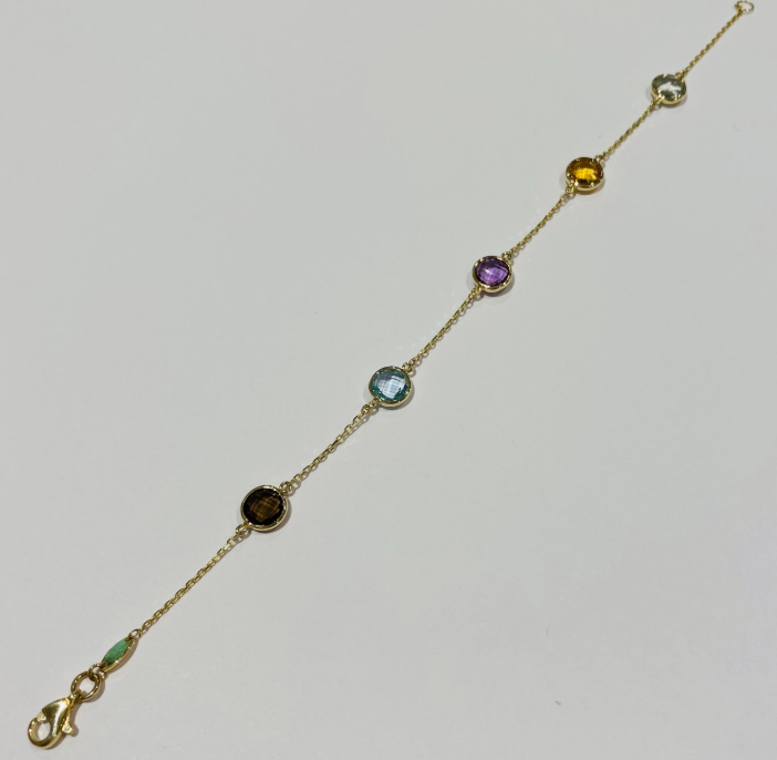 9ct yellow gold bracelet set with amethyst, blue topaz, citrine and quartz gemstones hand-made by Fogal & Barnes Harrogate