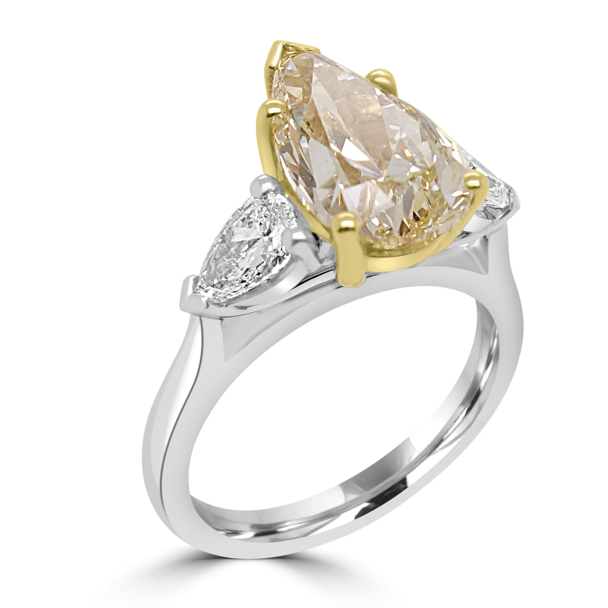 fancy yellow pear diamond ring, fancy light yellow diamond engagement ring, IGI certified yellow diamond, pear cut diamond three stone ring, natural yellow diamond UK, fancy colour diamond jeweller Harrogate