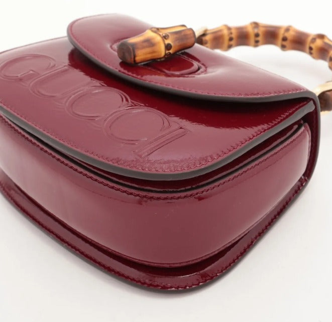 pre-loved Gucci bag UK, Gucci Bamboo 1947 Mini, Gucci Bamboo bag, Gucci Rosso Ancora, red Gucci bag, Gucci patent bag, second hand Gucci UK, Gucci top handle bag, luxury handbags Harrogate, pre-loved designer bags Yorkshire