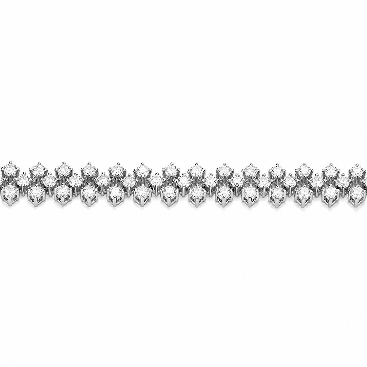 Close up white gold triple row diamond bracelet featuring 138 round brilliant diamonds totalling 3.5ct, shown coiled on white background