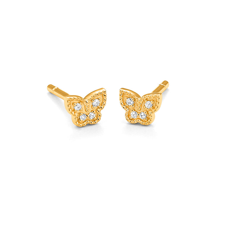 Pair of yellow gold diamond butterfly stud earrings with milgrain edge detailing and eight round brilliant diamonds, shown on white background