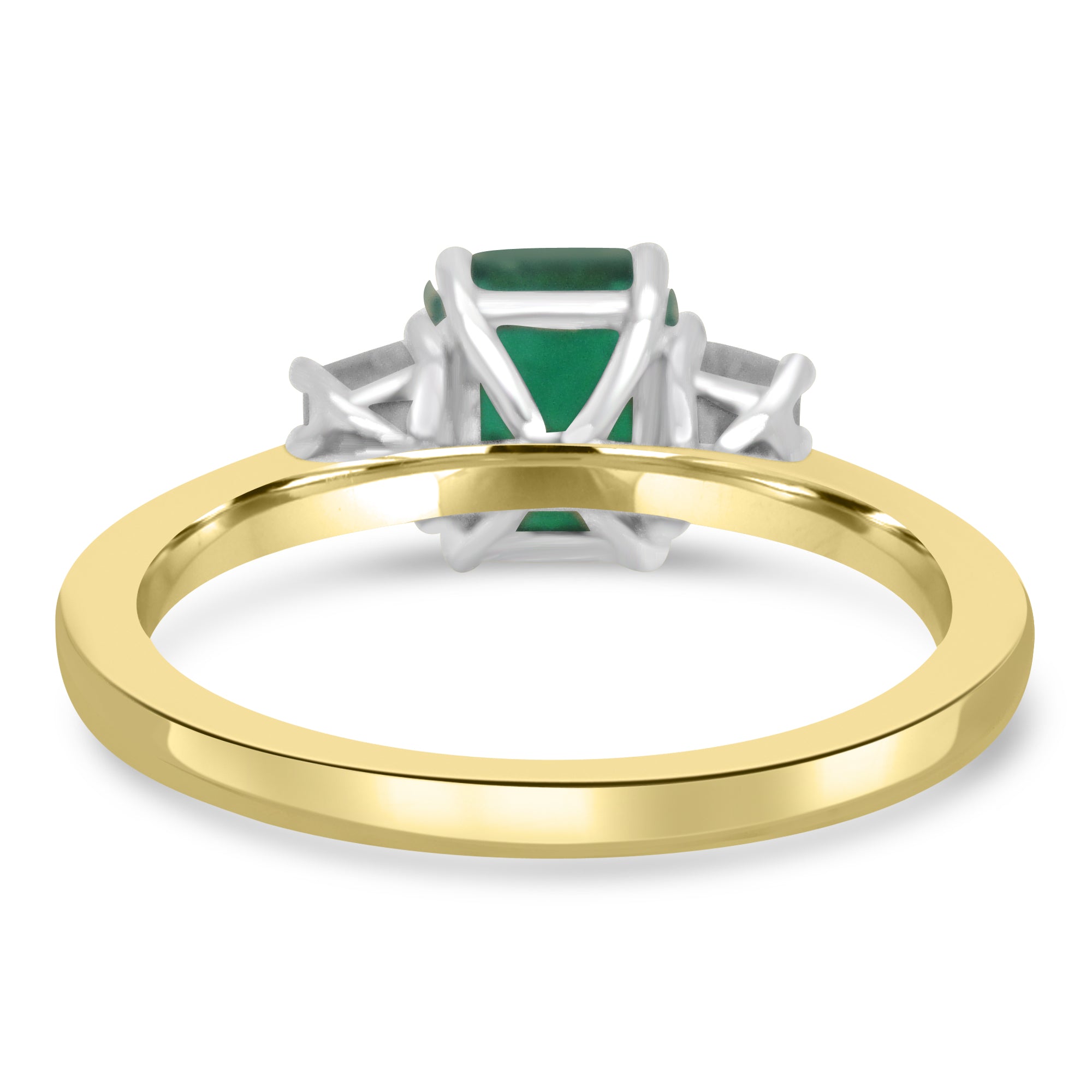 Emerald cut emerald and diamond set on 18k yellow gold engagement ring from fogal and barnes fine jewellers of harrogate. 