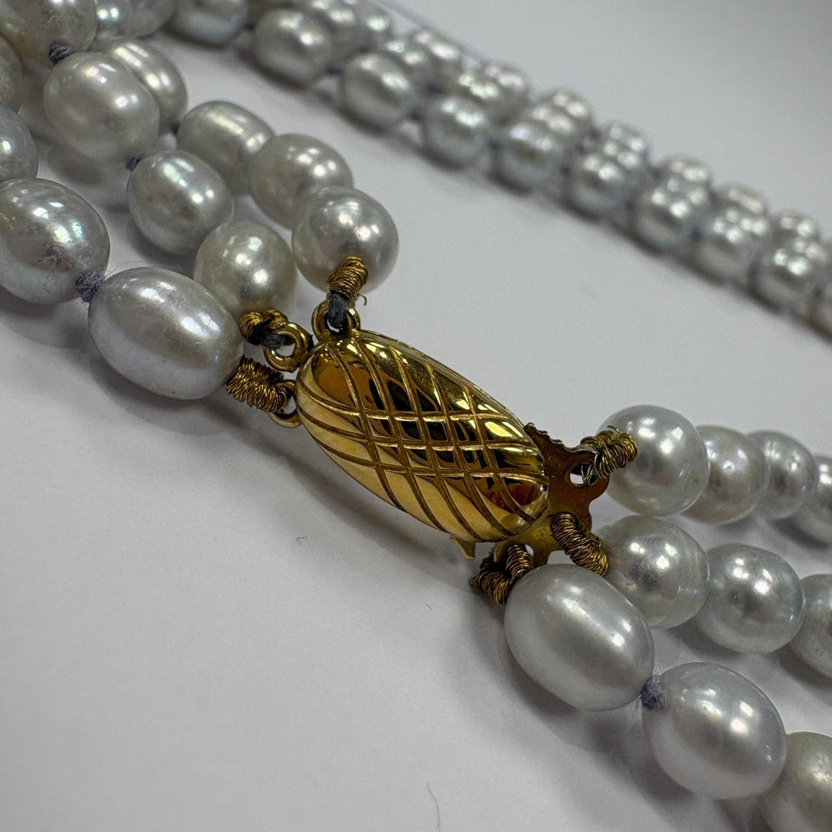 grey pearl necklace, triple strand pearl necklace, freshwater pearl necklace UK, multi strand pearl necklace, silver grey pearls, pearl necklace gold clasp, pre-loved pearl necklace, statement pearl necklace