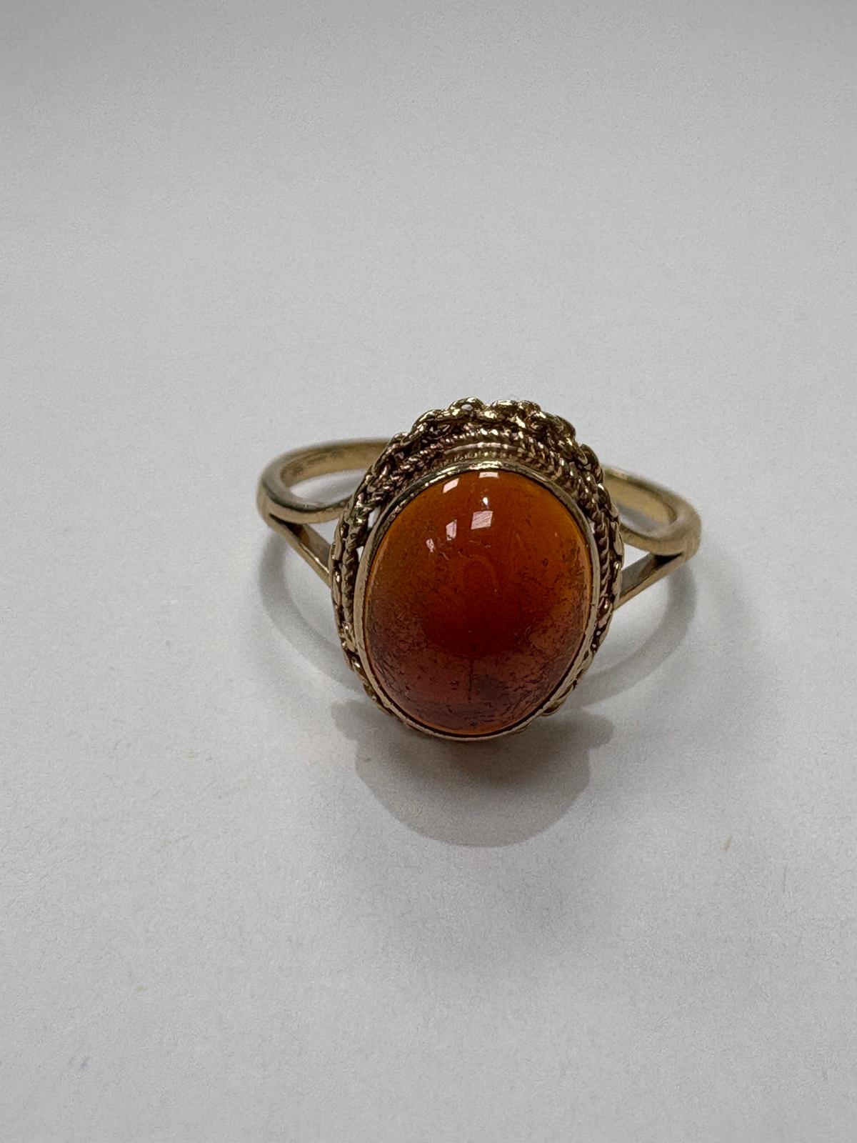 Vintage rope-twist garnet ring, 9ct gold, angled product shot