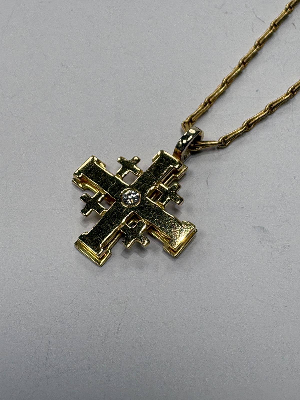 Reverse of 18ct yellow gold Jerusalem Cross pendant showing JERUSALEM inscription and 18K stamp