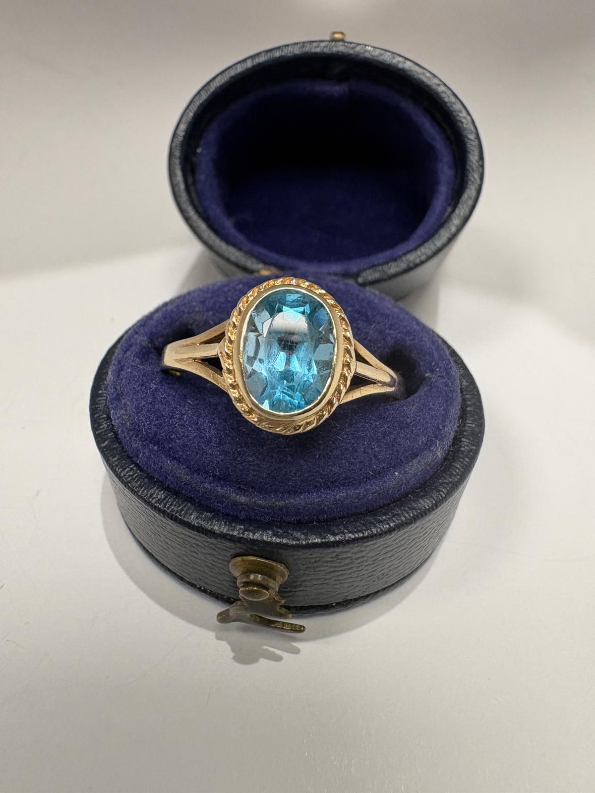 9k yellow gold oval blue topaz bezel set ring vintage size R Harrogate Jeweller shop