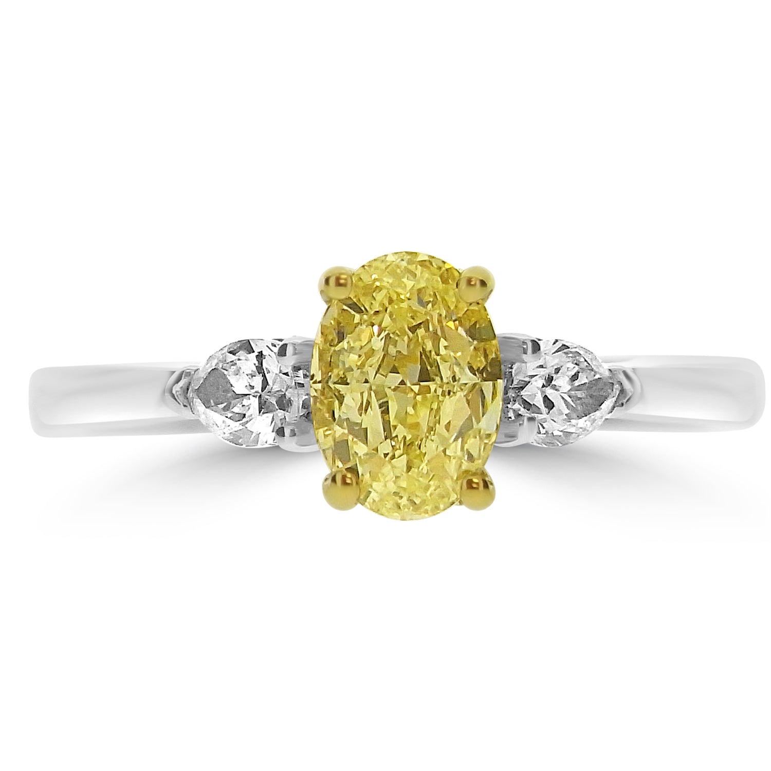 Ring with a yellow diamond and two smaller clear diamonds on a white background