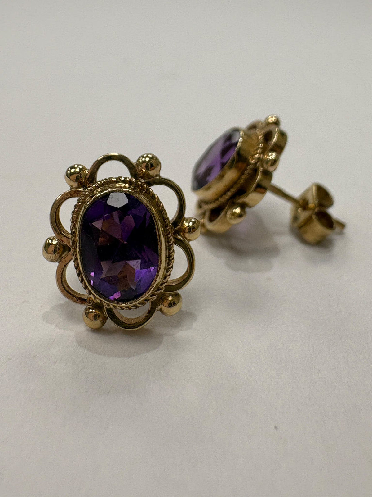 vintage amethyst earrings, pre-loved gold amethyst studs, second hand 9ct gold earrings UK, antique style amethyst earrings, purple gemstone studs Harrogate 