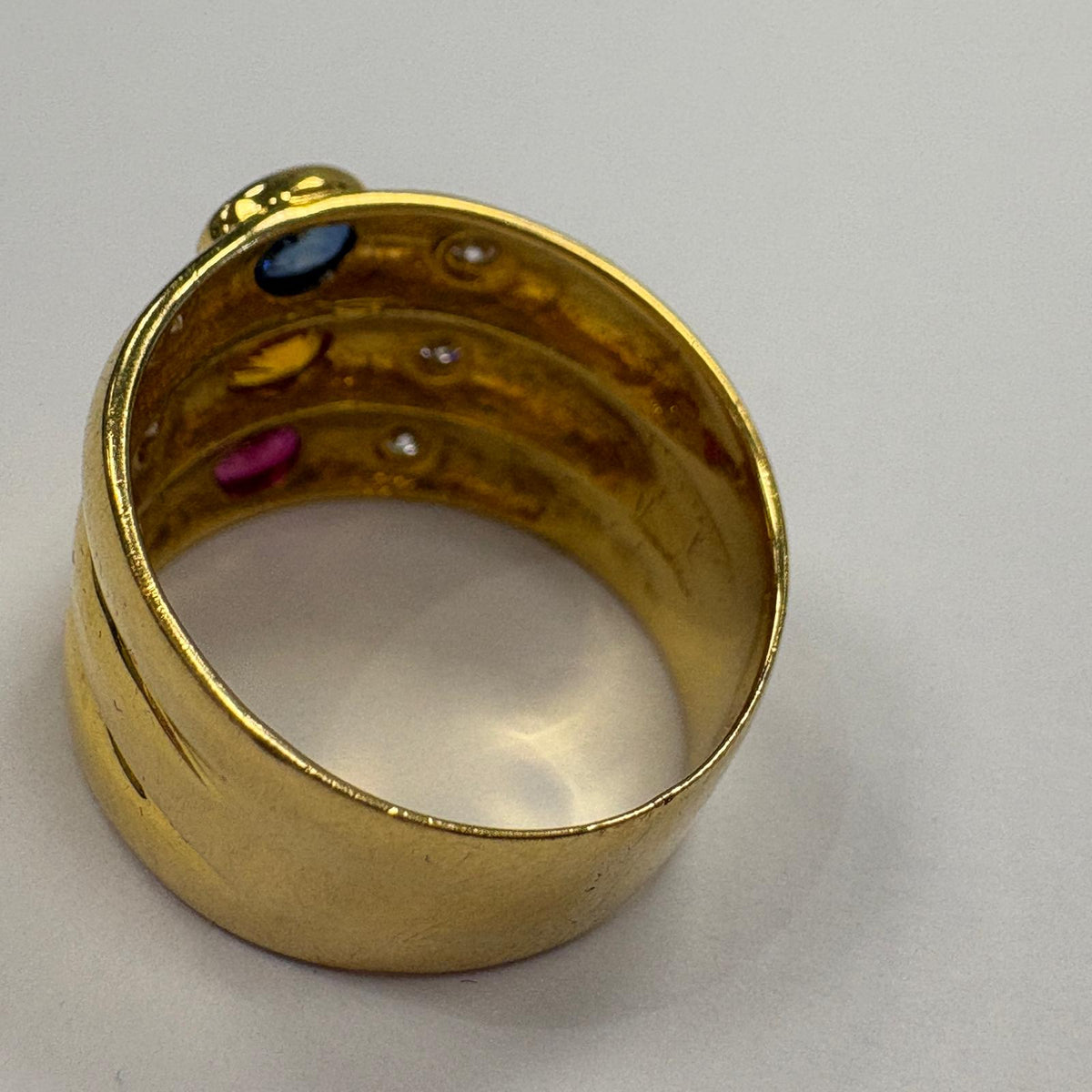 multi gem ring, ruby sapphire citrine ring, 18ct gold statement ring, triple band ring UK, wide gold gemstone ring, cocktail ring gold, pre-loved gemstone ring, birthstone family ring