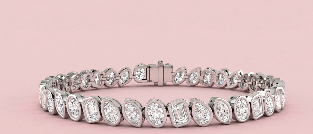 Lab grown multi-cut diamond tennis bracelet featuring 39 bezel set oval emerald pear and marquise diamonds totalling 8.50ct in yellow gold, shown on white background with CAD design detail