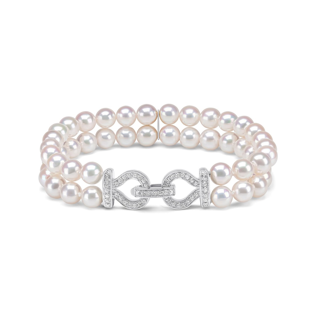 Double strand Akoya pearl and diamond bracelet in 18ct white gold, two rows of 6.5–7mm white Akoya pearls with 0.73ct pavé diamond interlocking link clasp and diamond bar ends