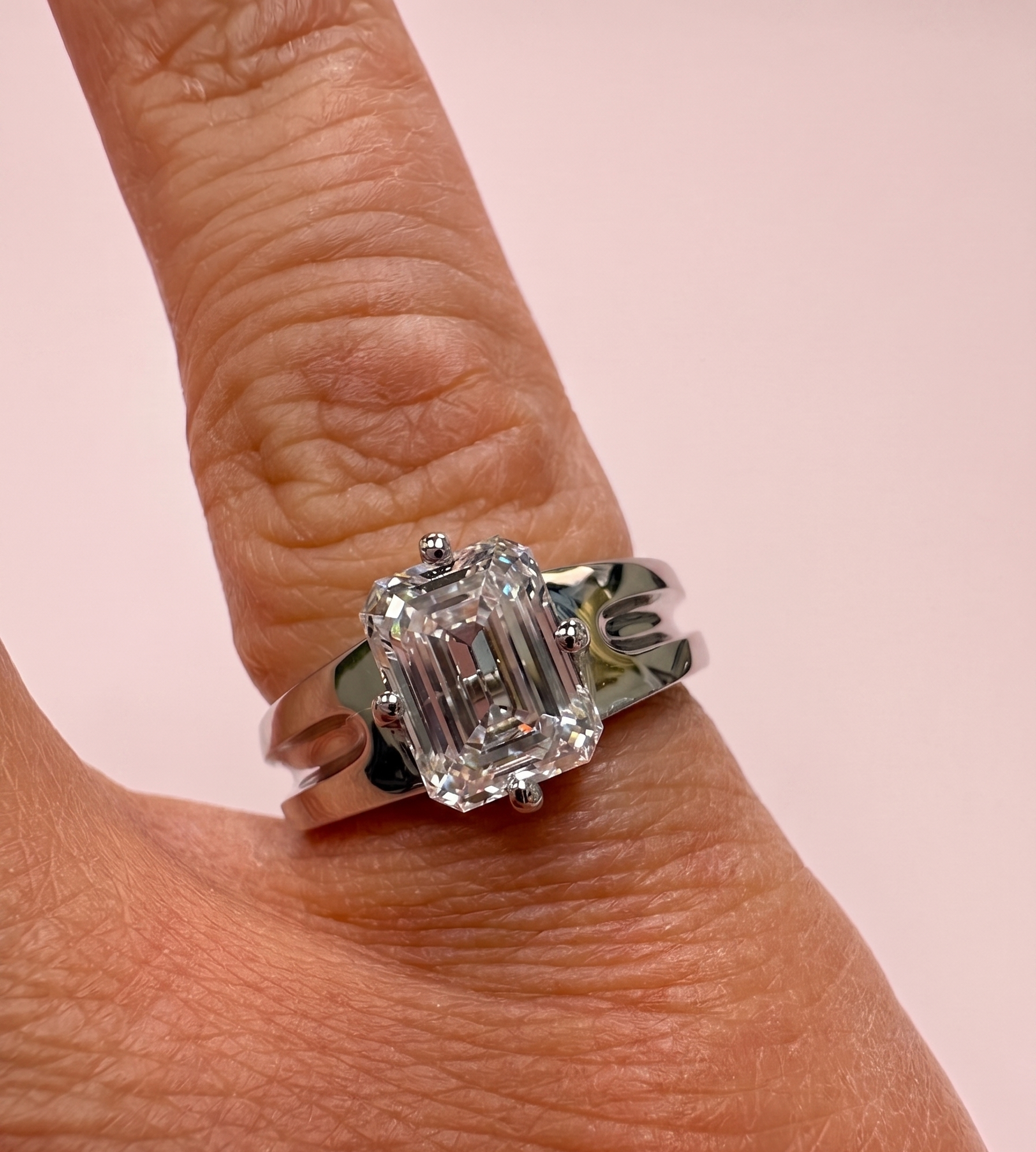 emerald cut engagement ring, emerald cut diamond solitaire, statement engagement ring, split shoulder engagement ring, lab grown diamond engagement ring UK, large emerald cut diamond ring, bespoke engagement ring Harrogate, platinum emerald cut ring, 18ct gold emerald cut ring, certified lab grown diamond, 2ct diamond ring, custom engagement ring Yorkshire, sculptural engagement ring, lab grown diamond ring near me, DVS emerald cut diamond