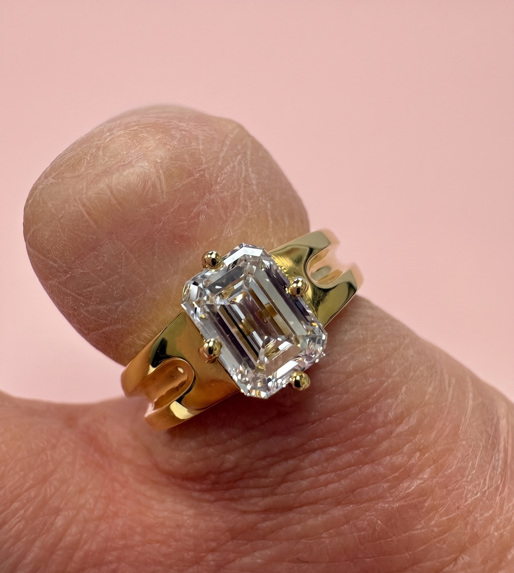 emerald cut engagement ring, emerald cut diamond solitaire, statement engagement ring, split shoulder engagement ring, lab grown diamond engagement ring UK, large emerald cut diamond ring, bespoke engagement ring Harrogate, platinum emerald cut ring, 18ct gold emerald cut ring, certified lab grown diamond, 2ct diamond ring, custom engagement ring Yorkshire, sculptural engagement ring, lab grown diamond ring near me, DVS emerald cut diamond