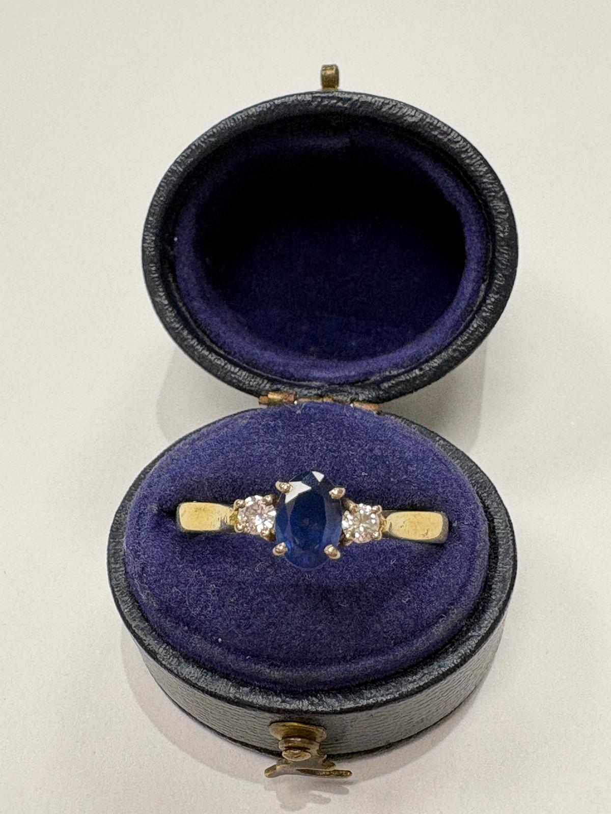 sapphire and diamond ring, three stone sapphire ring, 18ct gold sapphire ring, second hand sapphire ring UK, pre-loved sapphire ring, vintage sapphire ring, oval sapphire ring, September birthstone ring, sapphire trilogy ring, second hand jewellery Harrogate, second hand jewellery Leeds, second hand jewellery York, second hand jewellery Yorkshire, pre-owned sapphire ring UK,