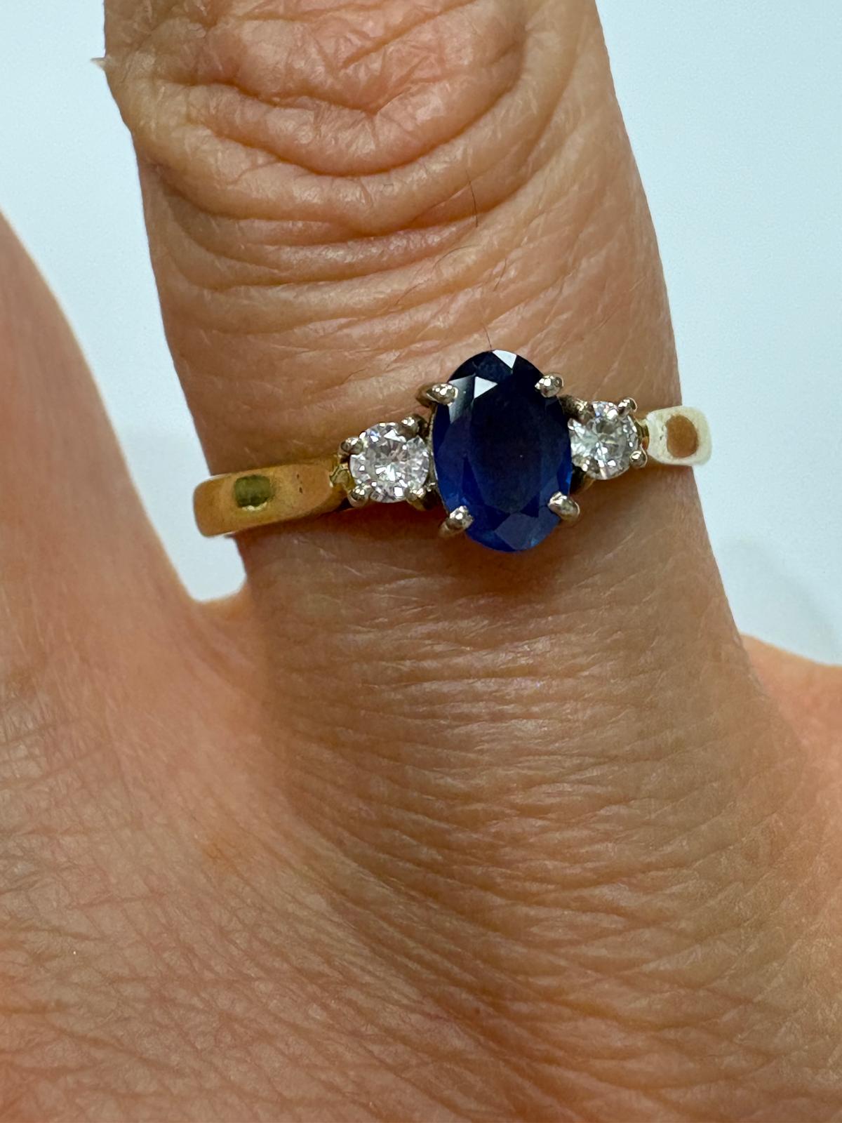 sapphire and diamond ring, three stone sapphire ring, 18ct gold sapphire ring, second hand sapphire ring UK, pre-loved sapphire ring, vintage sapphire ring, oval sapphire ring, September birthstone ring, sapphire trilogy ring, second hand jewellery Harrogate, second hand jewellery Leeds, second hand jewellery York, second hand jewellery Yorkshire, pre-owned sapphire ring UK,