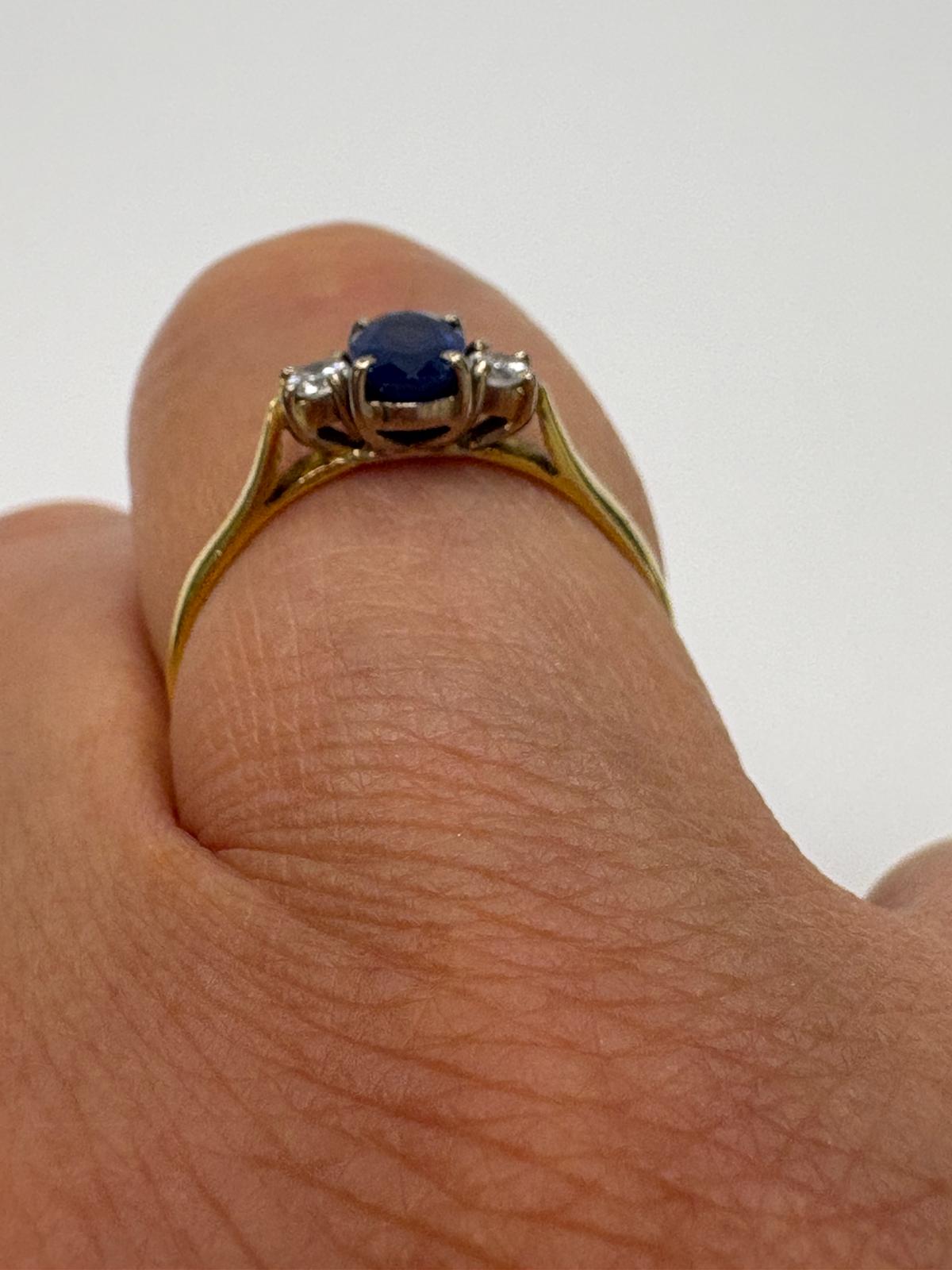 sapphire and diamond ring, three stone sapphire ring, 18ct gold sapphire ring, second hand sapphire ring UK, pre-loved sapphire ring, vintage sapphire ring, oval sapphire ring, September birthstone ring, sapphire trilogy ring, second hand jewellery Harrogate, second hand jewellery Leeds, second hand jewellery York, second hand jewellery Yorkshire, pre-owned sapphire ring UK,
