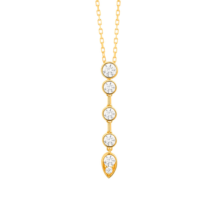 Yellow gold bezel set diamond drop pendant necklace featuring five graduating diamonds finishing in a pear shape, on a 42cm chain, shown on white background