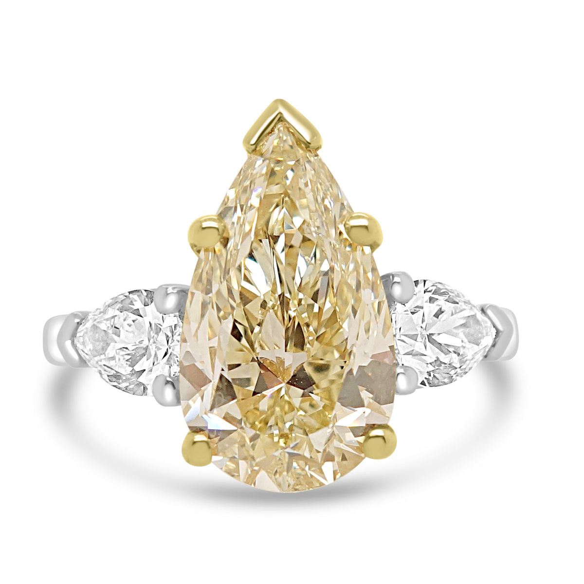 fancy yellow pear diamond ring, fancy light yellow diamond engagement ring, IGI certified yellow diamond, pear cut diamond three stone ring, natural yellow diamond UK, fancy colour diamond jeweller Harrogate