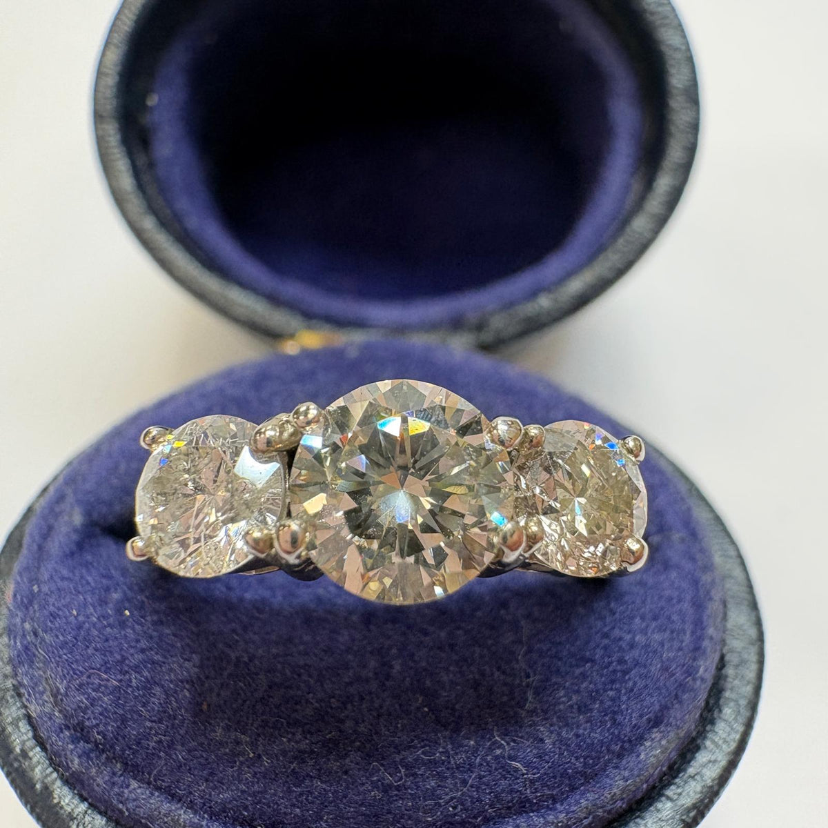three stone diamond ring, trilogy diamond ring UK, platinum diamond ring, pre-loved engagement ring, second hand diamond ring, 1.5 carat diamond ring, anniversary diamond ring, pre-owned trilogy ring