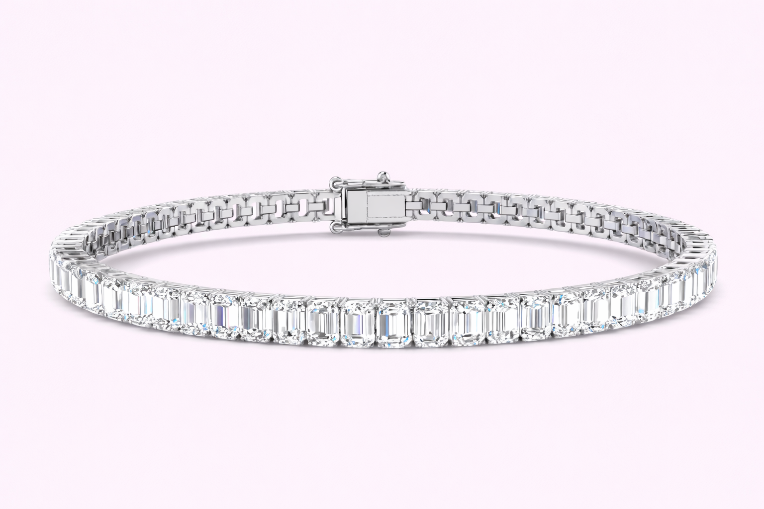 Lab-grown emerald cut diamond tennis bracelet 9.75ct set in yellow gold by Fogal and Barnes Harrogate jewellers