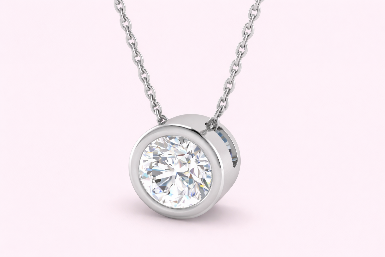 Lab-grown diamond bezel pendant in yellow gold with round brilliant diamond on fine chain, bespoke jewellery by Fogal & Barnes Harrogate