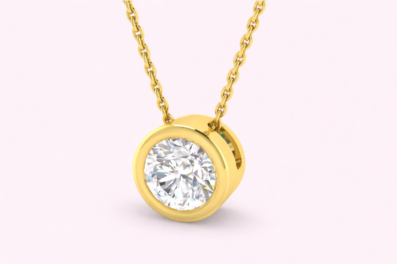 Lab-grown diamond bezel pendant in yellow gold with round brilliant diamond on fine chain, bespoke jewellery by Fogal & Barnes Harrogate