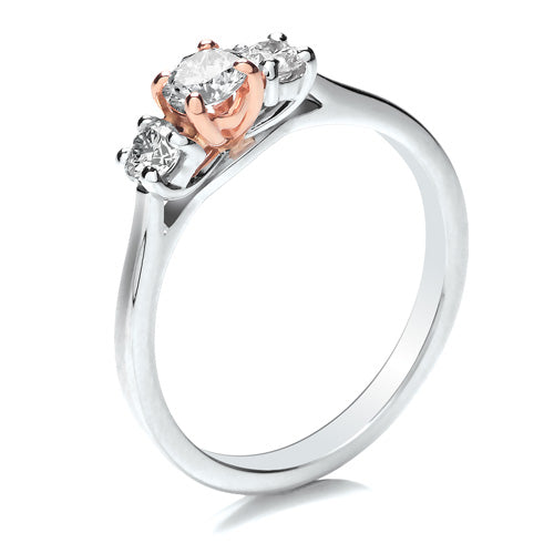 ROUND BRILLIANT CUT DIAMOND TRILOGY ENGAGEMENT RING WITH ROSE GOLD CENTRE