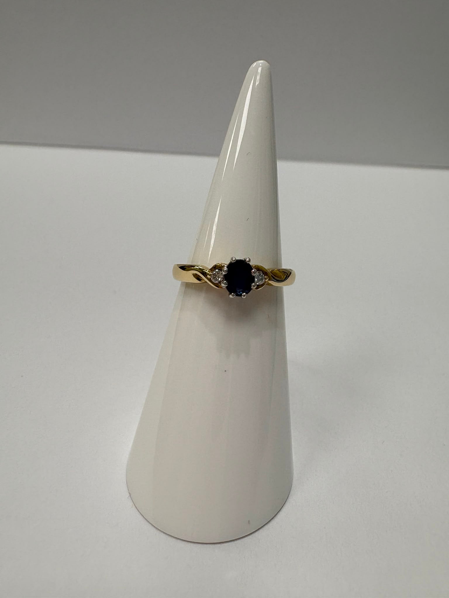 apphire and diamond ring, two tone sapphire ring, second hand sapphire ring UK, pre-loved sapphire ring, vintage sapphire ring, 9ct gold sapphire ring, sapphire three stone ring, blue sapphire ring second hand, second hand jewellery Harrogate, second hand jewellery Leeds, second hand jewellery York, second hand jewellery Yorkshire, pre-owned sapphire ring UK, antique style sapphire ring, September birthstone ring, buy second hand sapphire ring, sapphire ring size L half, sapphire ring near me, fine jeweller