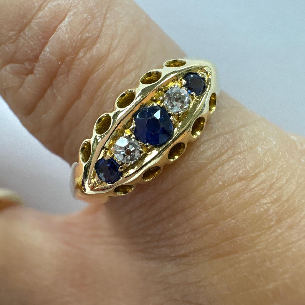 antique five stone ring, Edwardian sapphire ring, old cut diamond ring UK, antique sapphire and diamond ring, 18ct gold five stone ring, antique engagement ring, boat shaped ring, Edwardian engagement ring