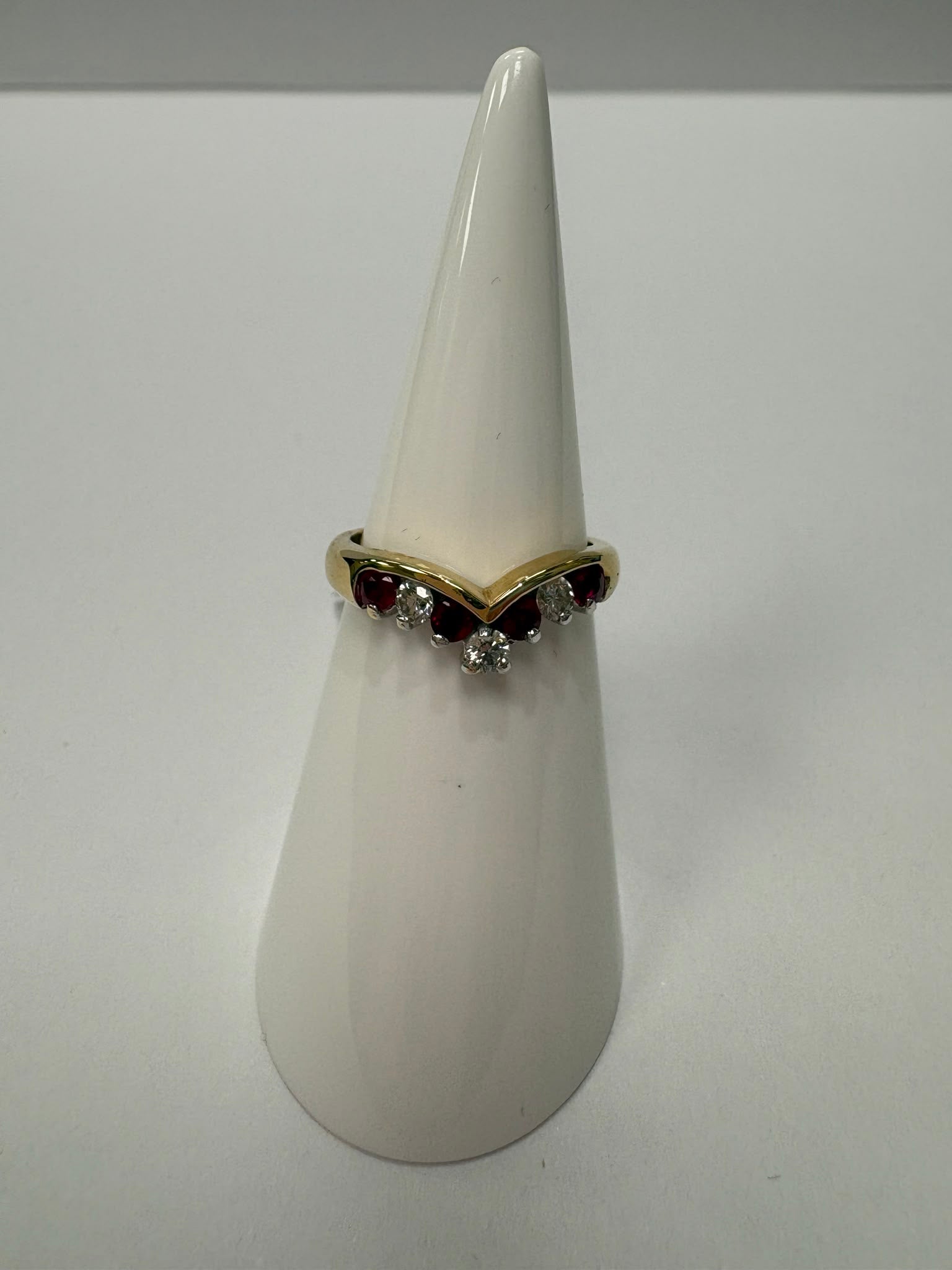 ruby and diamond wishbone ring, chevron ring ruby diamond, natural ruby ring UK, second hand wishbone ring, pre-loved ruby ring, vintage wishbone ring, 9ct gold ruby diamond ring, ruby diamond stacking ring, wishbone wedding ring, second hand jewellery Harrogate, second hand jewellery Leeds, second hand jewellery York, second hand jewellery Yorkshire, pre-owned natural ruby ring UK, natural diamond wishbone ring, unique ruby ring, buy second hand wishbone ring, wishbone ring size N, ruby ring near me, fine 