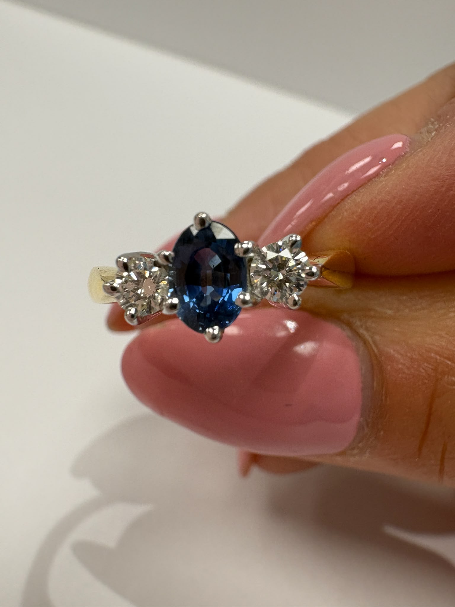 sapphire and diamond ring, three stone sapphire ring, 18ct gold sapphire ring, second hand sapphire ring UK, pre-loved sapphire ring, vintage sapphire ring, oval sapphire ring, September birthstone ring, sapphire trilogy ring, second hand jewellery Harrogate, second hand jewellery Leeds, second hand jewellery York, second hand jewellery Yorkshire, pre-owned sapphire ring UK, 18ct sapphire engagement ring, buy second hand sapphire ring, sapphire ring size L, sapphire ring near me, fine jewellery Harrogate, p
